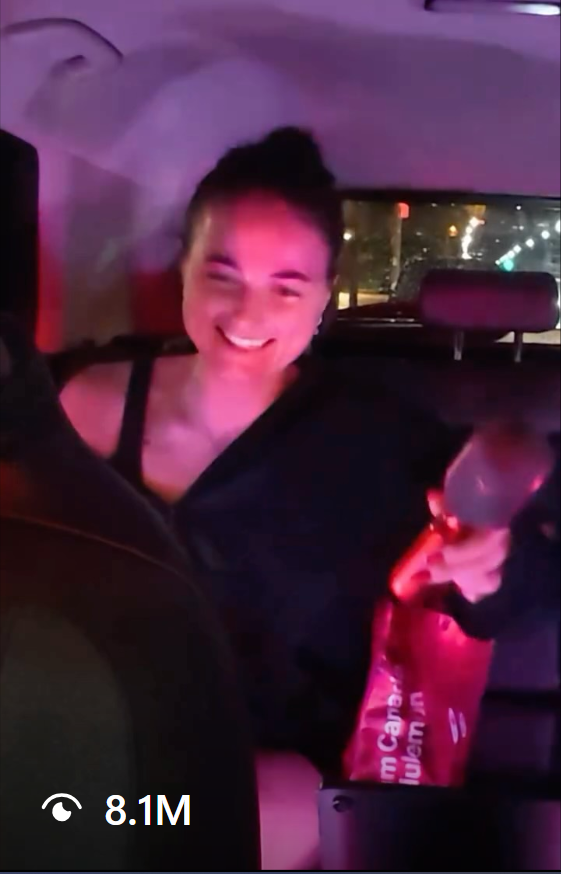Inside a karaoke ride with The Tripman, a passenger singing under party lights